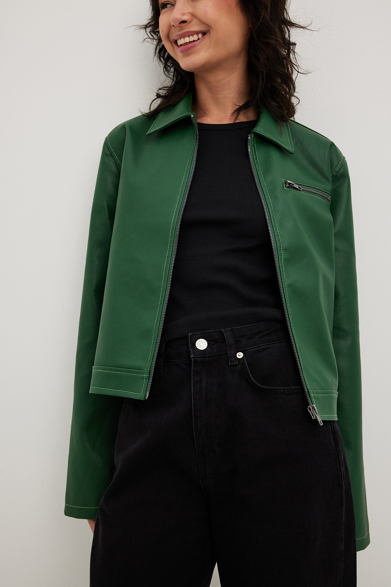 NA-KD contrast stitch faux leather jacket in green