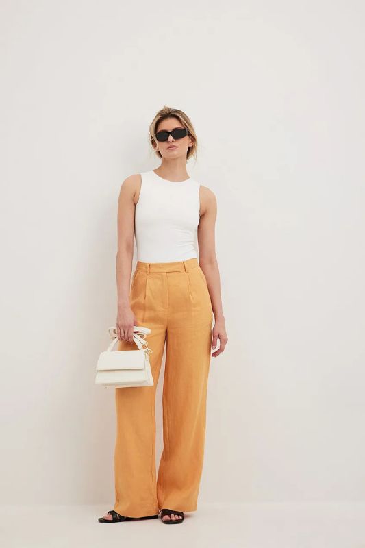Comfy and cute casual outfit.  Beige linen pants, Linen pants outfit,  Summer work outfits