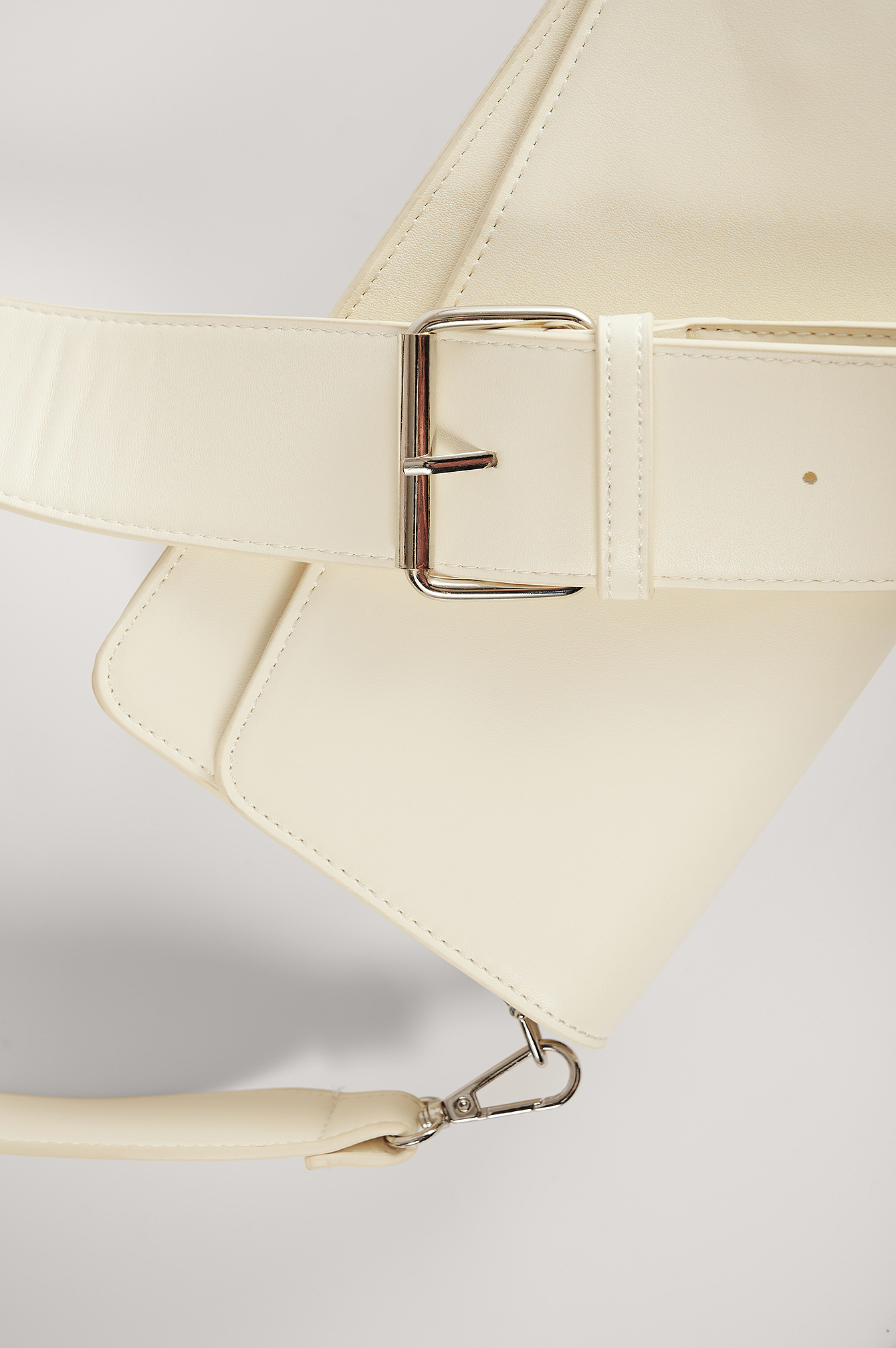 asymmetric front flap bag