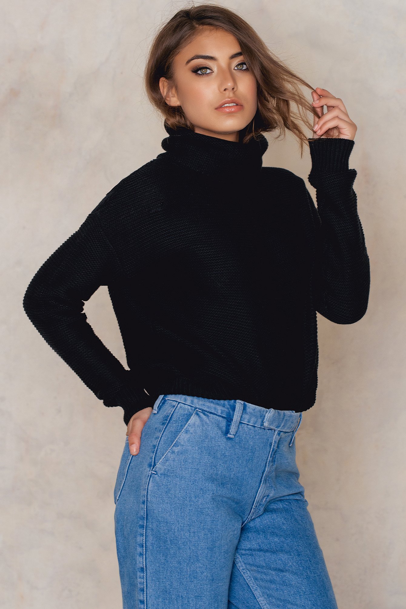 roll neck black sweater