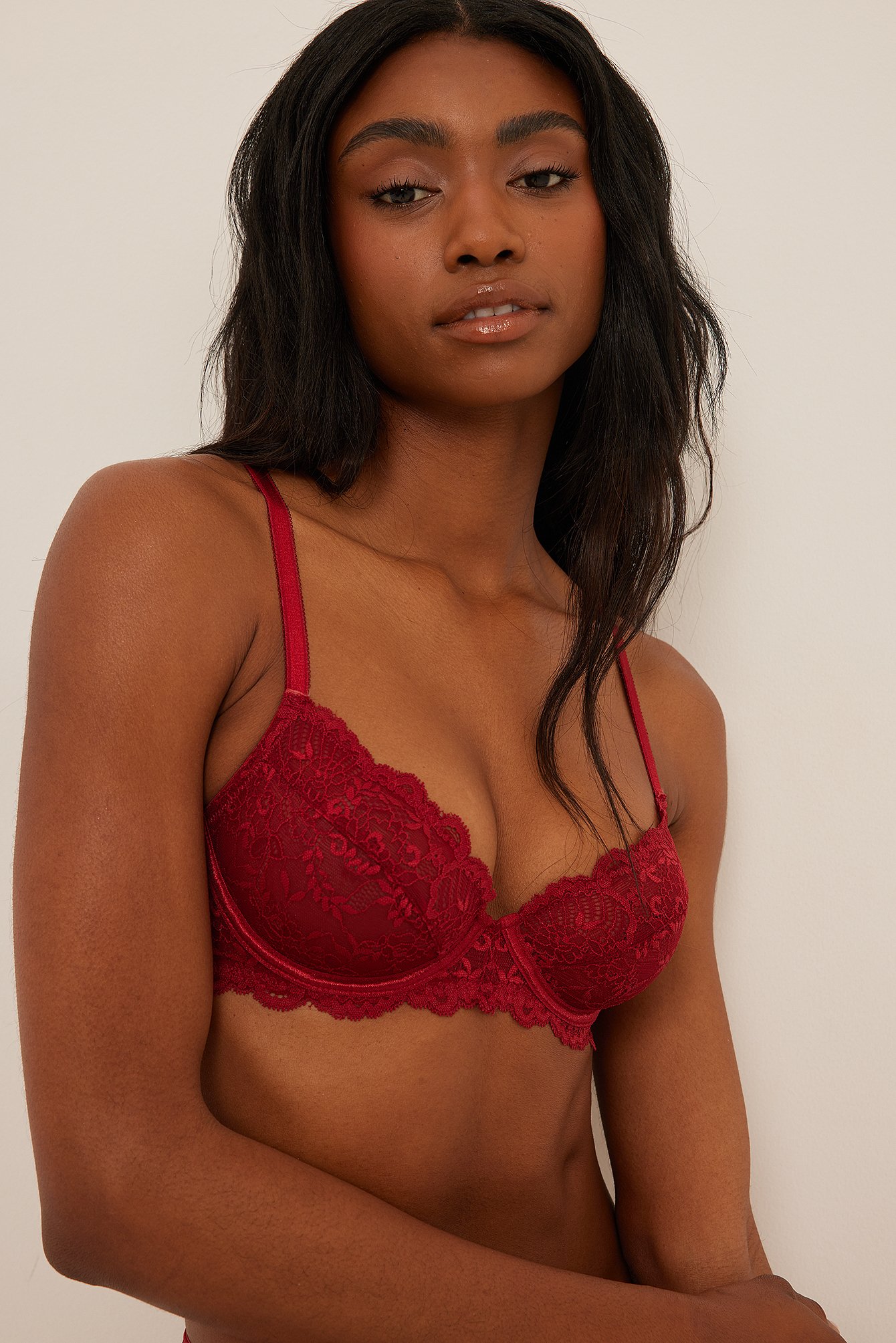 Victoria Secret push-up bra size 36C. Red and black lace with a bow tie.
