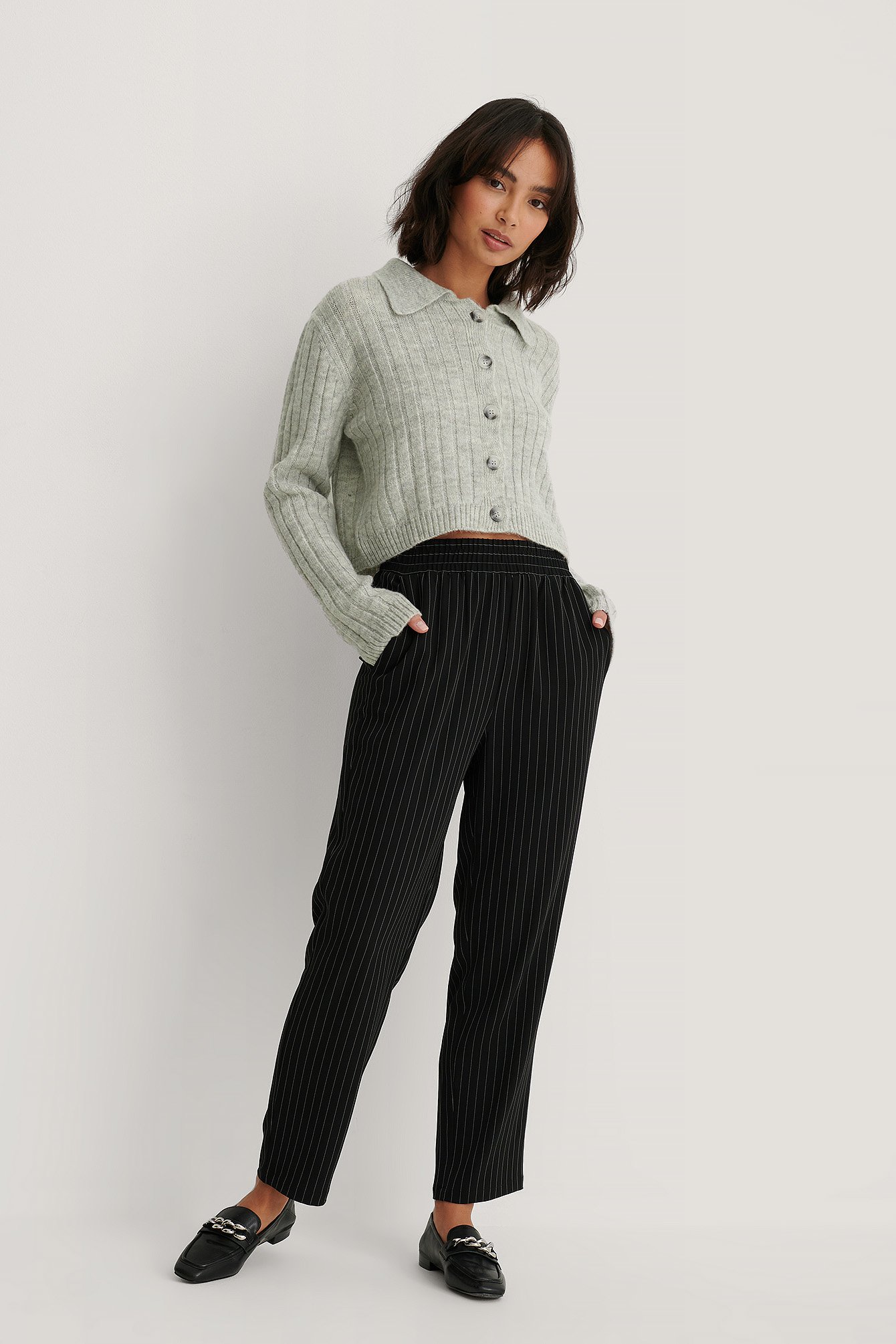 Pinstripe trousers with elastic waistband - Trousers - Women