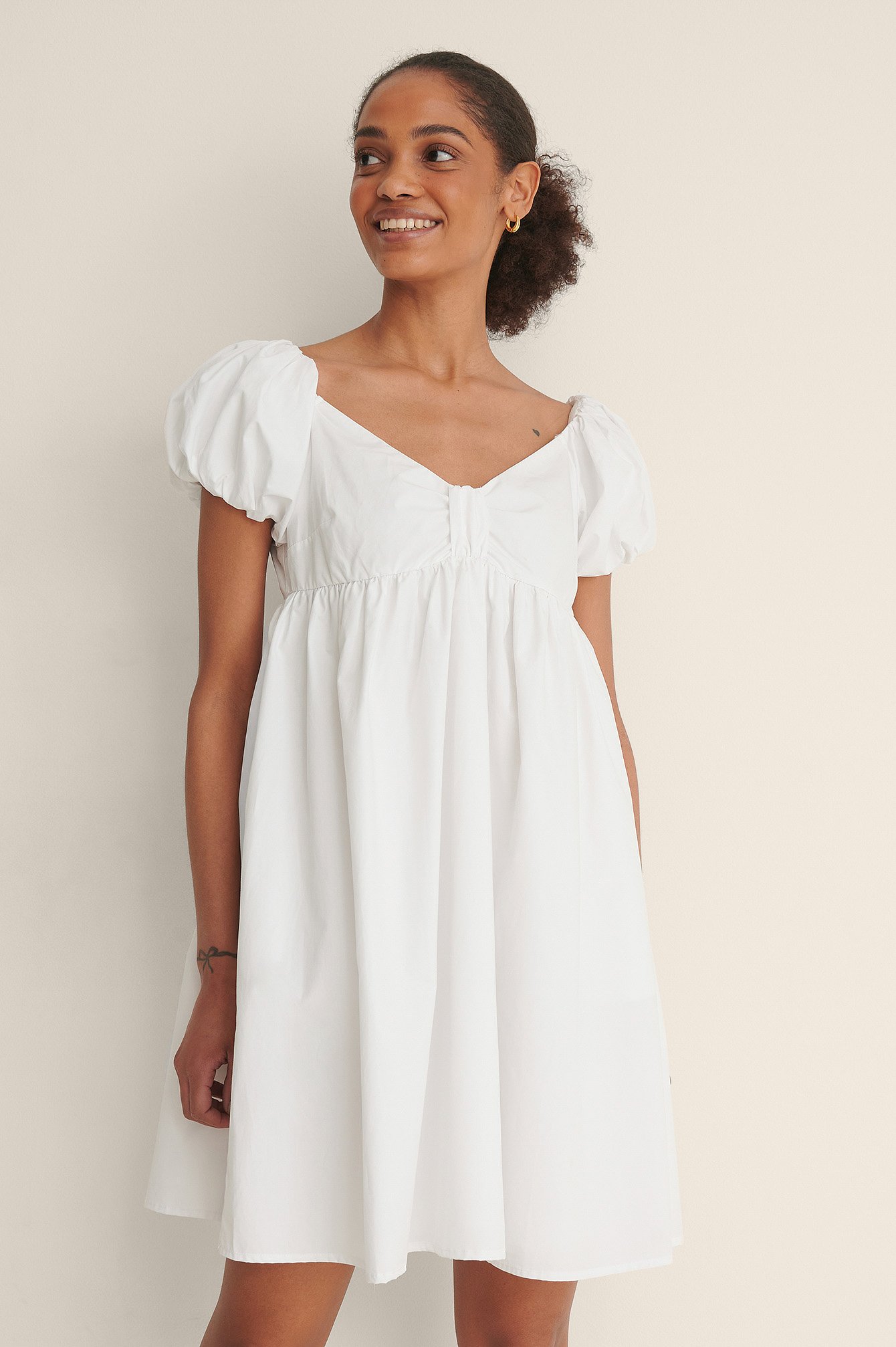 white cotton off shoulder dress