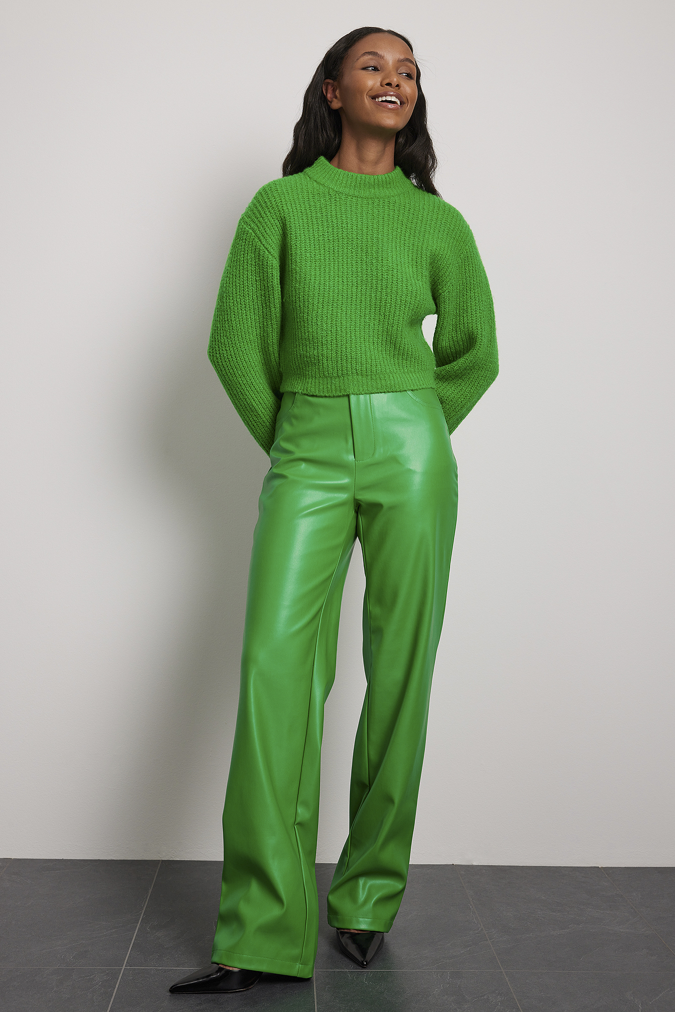 Bottle Green Faux Leather Pleat Wide Leg Trousers | PrettyLittleThing