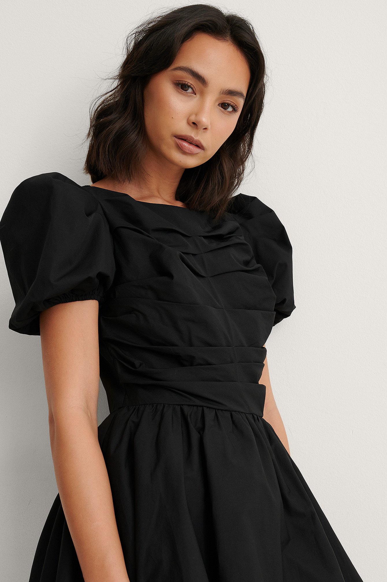 black puff sleeve ruched dress