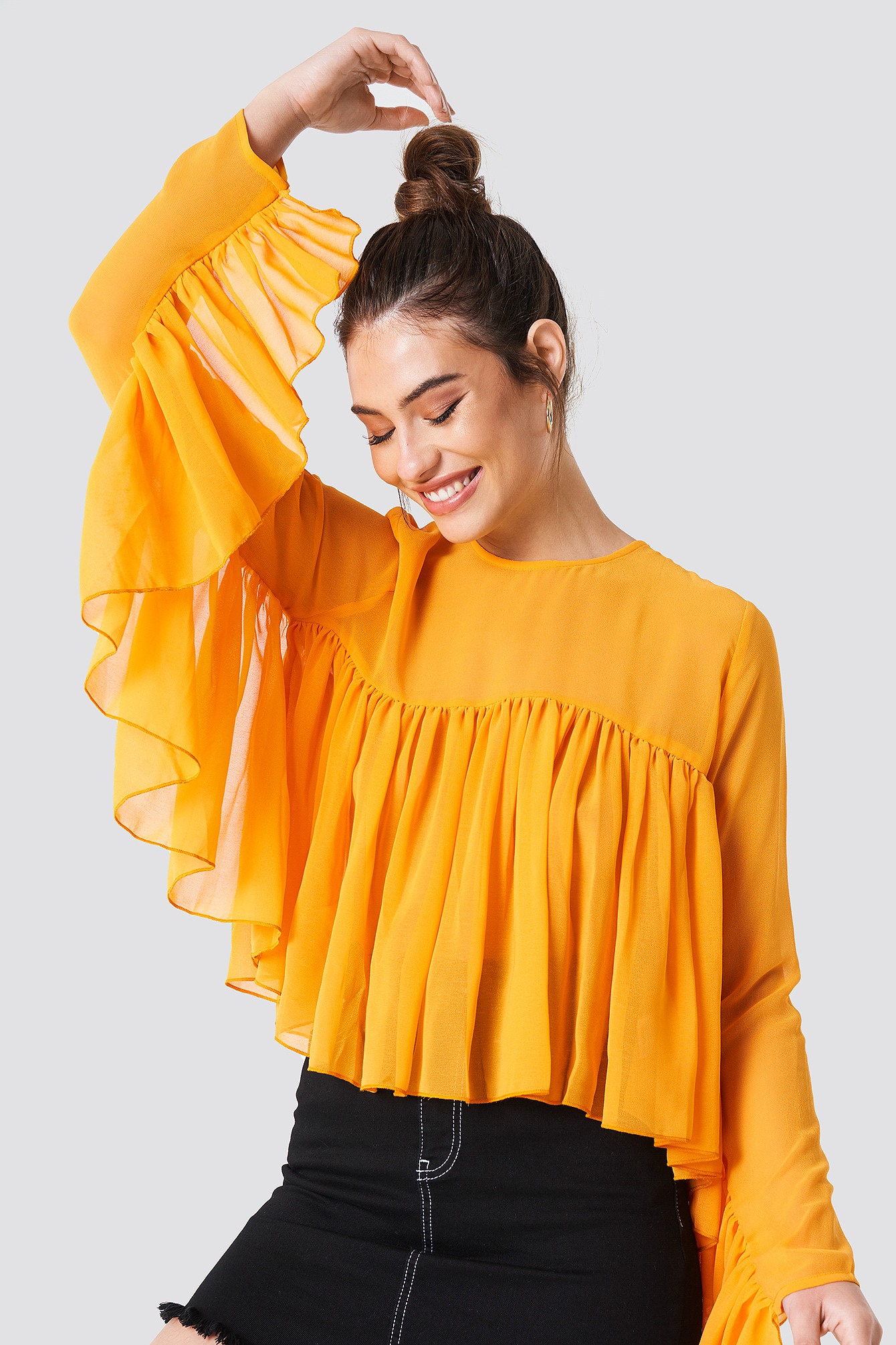 orange ruffle top