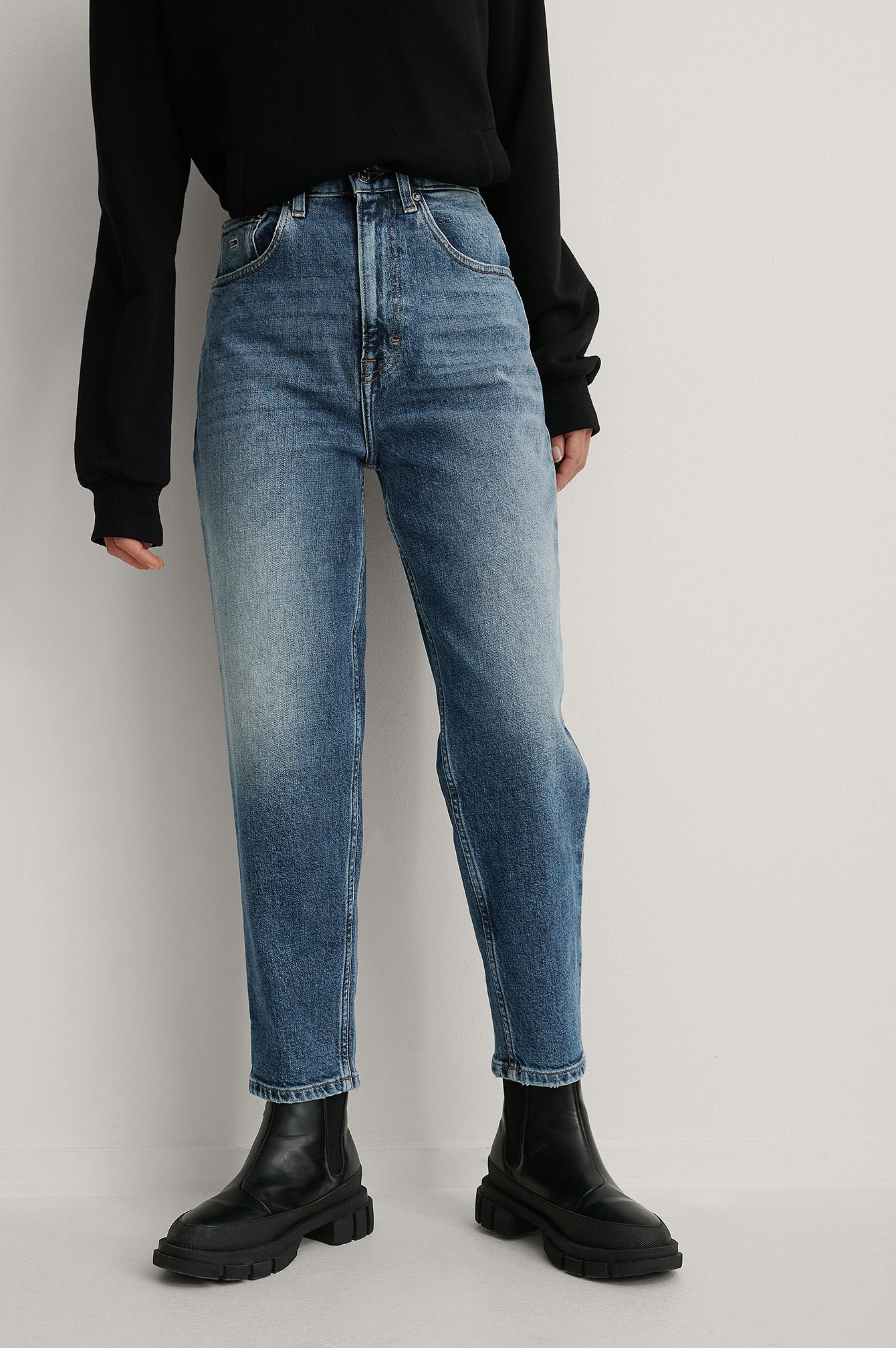 high rise mid wash mom jeans