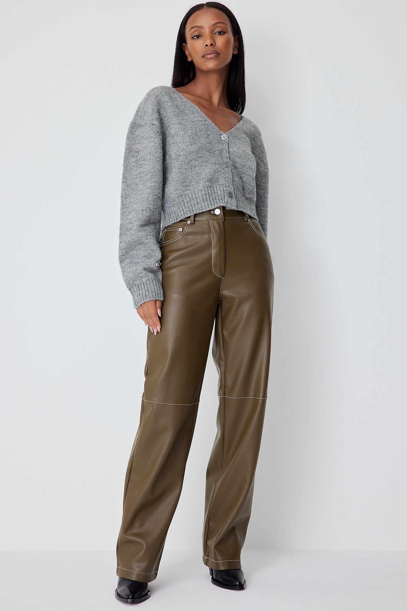 Leather-effect trousers with belt - Woman | Mango Ireland