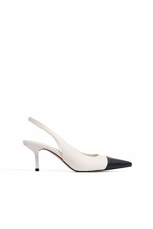 Cream/Black Contrast Toe Pumps