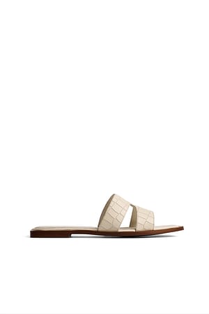 Offwhite Lederslipper mit Cut-Outs