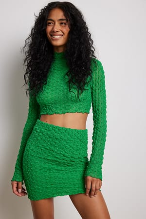 Green Tætsiddende og struktureret mini-nederdel