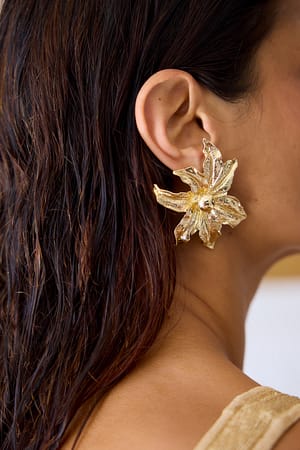 Gold Boucles d'oreilles avec fleur