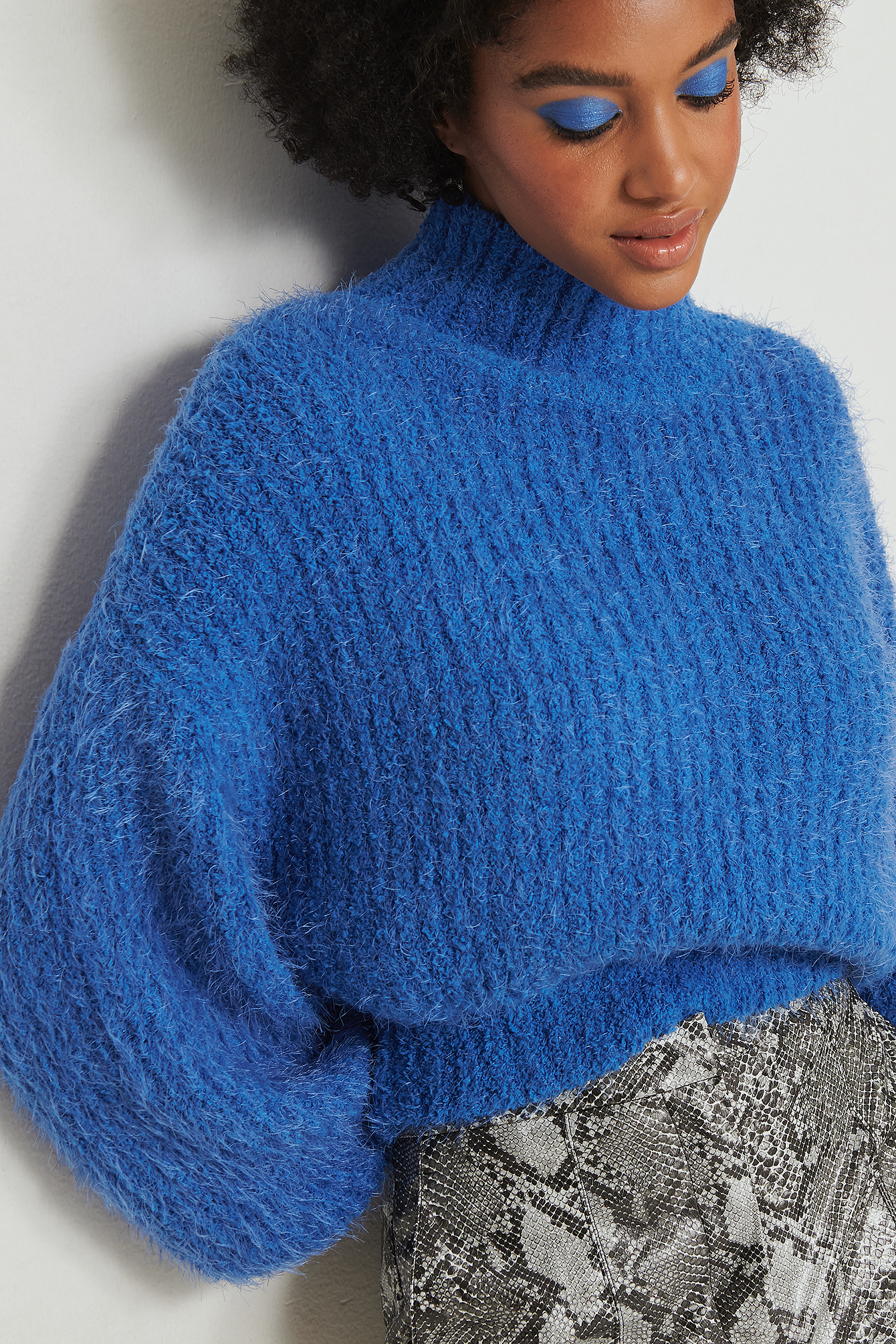 blue knit turtleneck