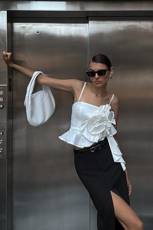 Off White Top aderente con grande fiore