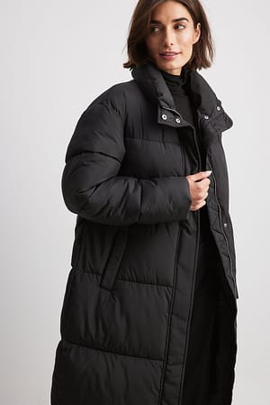 Black Lång, vadderad jacka med bälte
