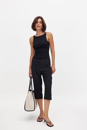 Stripe Pantaloni capri a vita bassa