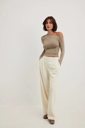 off-the-shoulder stripe top paired with wide leg pants for fall