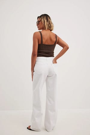 High waist wide leg pants with gold button accents in white