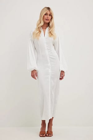 https://www.na-kd.com/resize/globalassets/magazine/white-shirt-dress-outfits-5-essentials-for-you-in-2023/nakd_jacquard_midi_dress_1018-010143-0001_1-1.jpg?ref=29BEDECB98&quality=80&sharpen=0.3&width=300