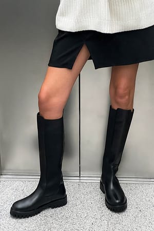 Black Knehøye elastiske boots i skinn