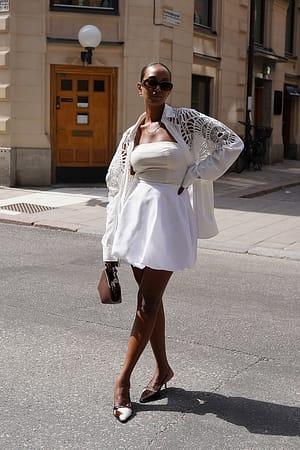 White Minifalda con bajo abullonado