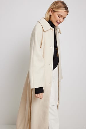 jukbeen Motiveren Geweldig Lange jas met split aan de achterkant Beige | NA-KD