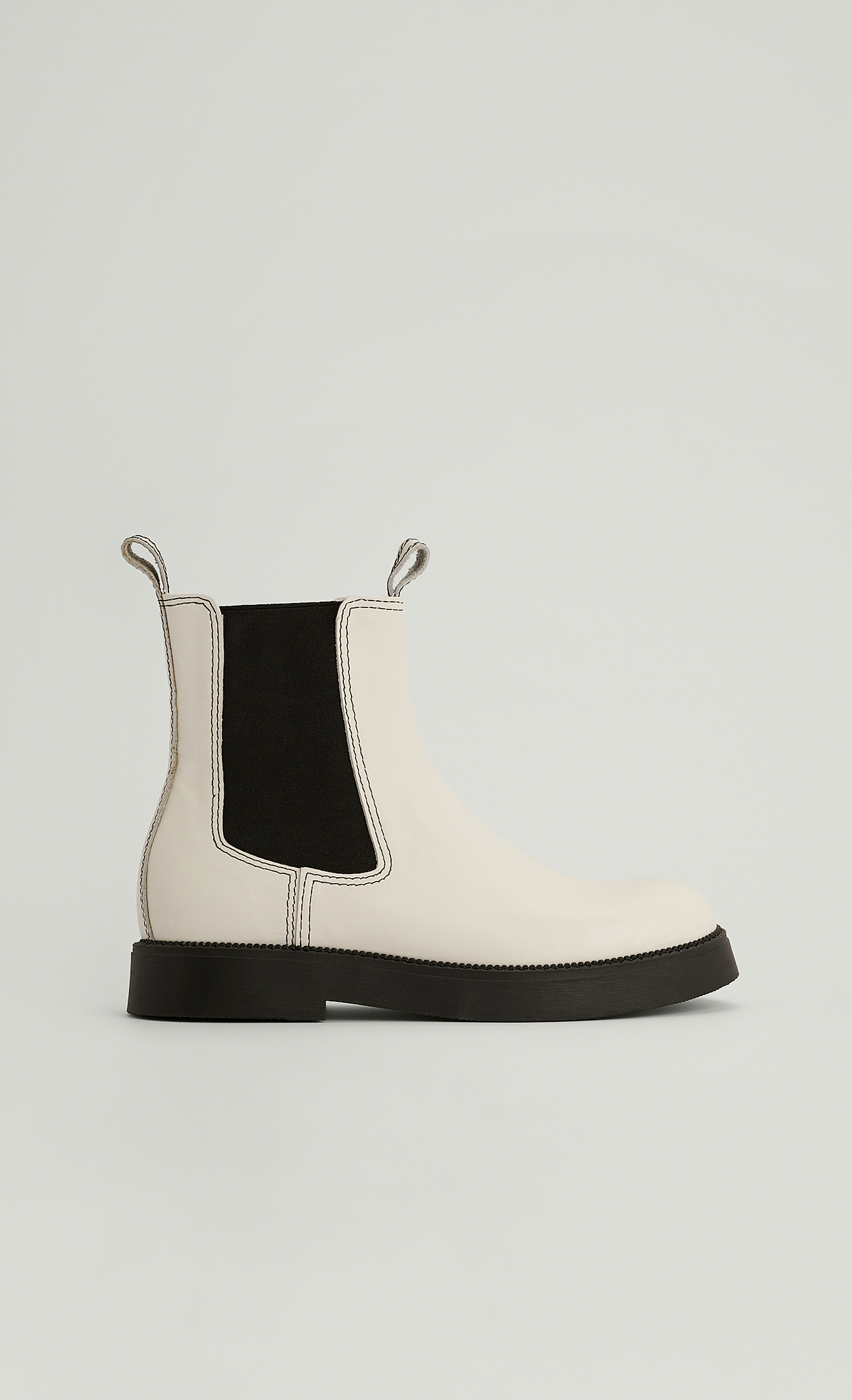 cream boots black sole