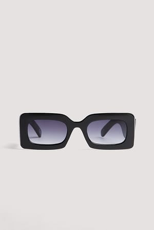 Black Solglasögon med stora chunky bågar