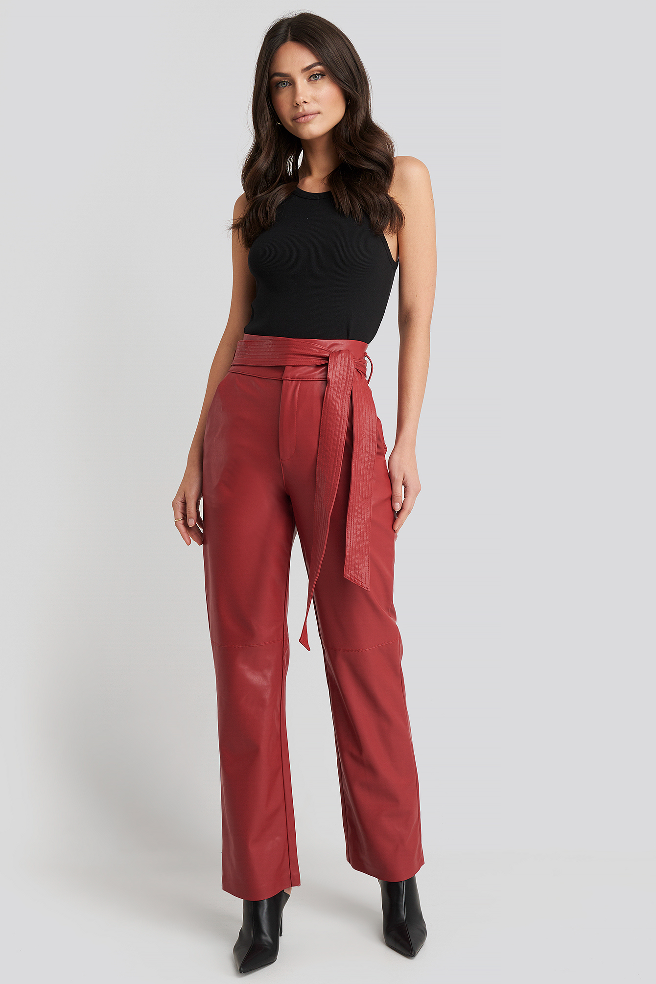 red faux leather pants