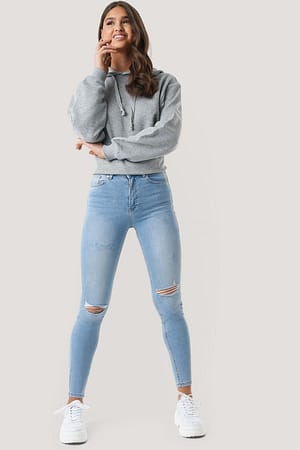 Sovesal enkelt gang Med andre ord Højtaljede skinny jeans med huller Blå | NA-KD
