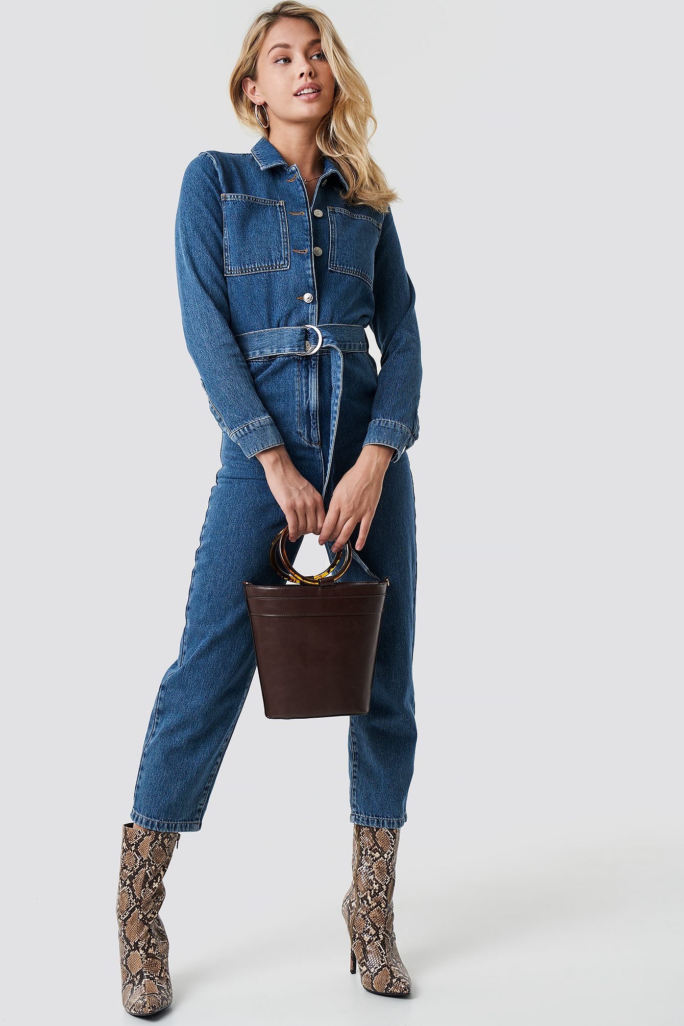 denim jumpsuit with boots