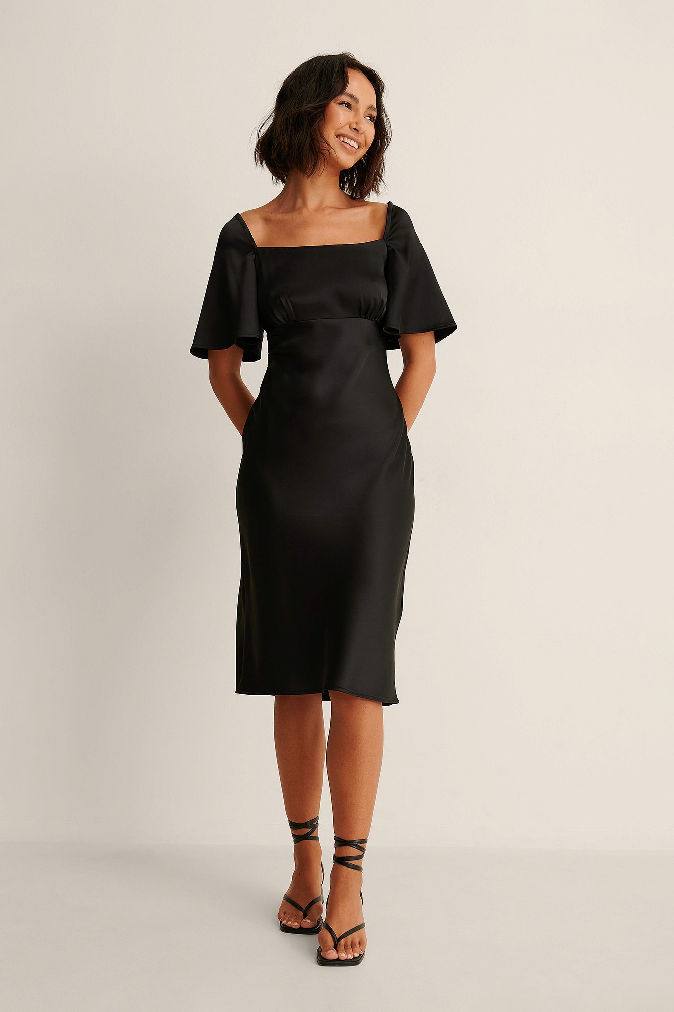 Black flounce sleeve clearance dress