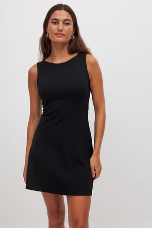 Black Ärmelloses Punto-Kleid mit ausgestelltem Rock