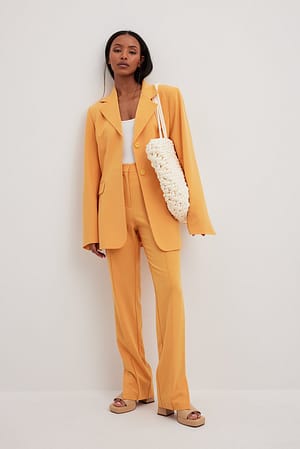 Orange Slim-malliset suorat pukuhousut halkioilla