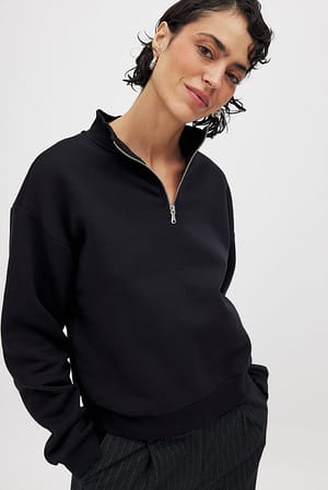 Black Pullover mit Reißverschlussdetail